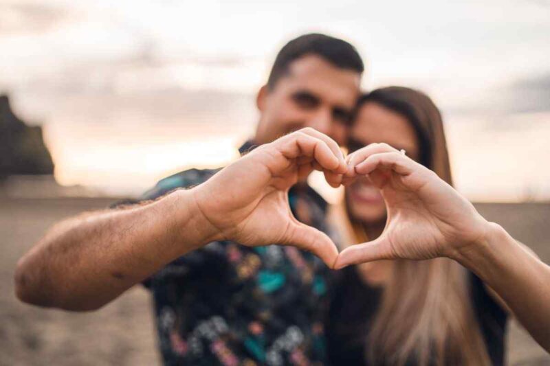couple making heart from their hands 1146653475