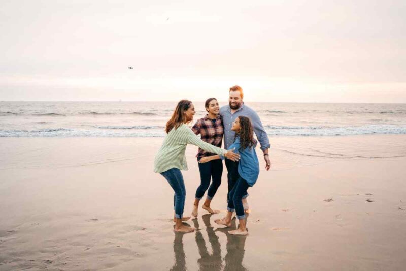 family at the beach 1086492012