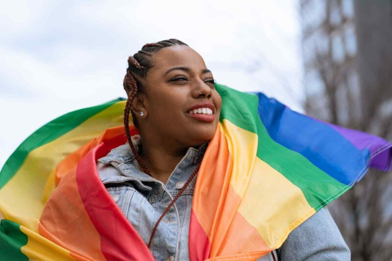 woman wearing pride flag  1392804891